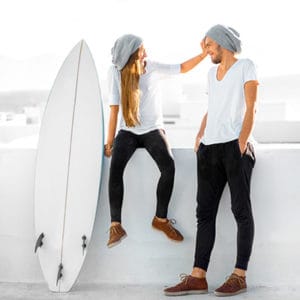 couple-of-standing-surfers